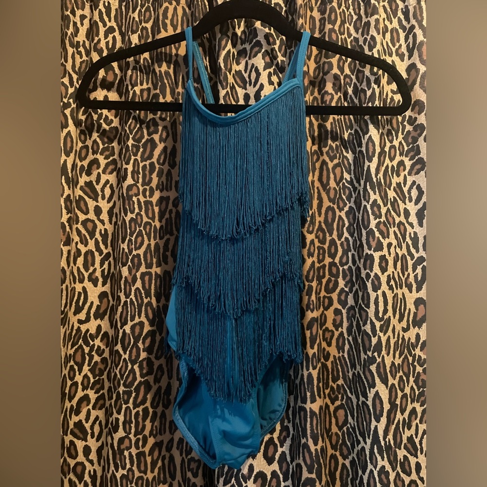 Turquoise MC Weissman fringe leotard and sequin booty shorts